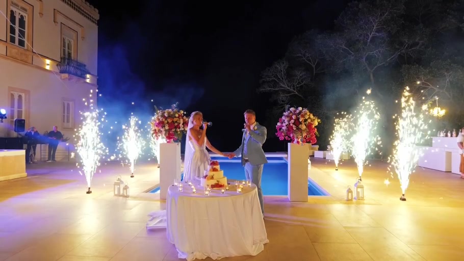A couple celebrating their wedding in the evening